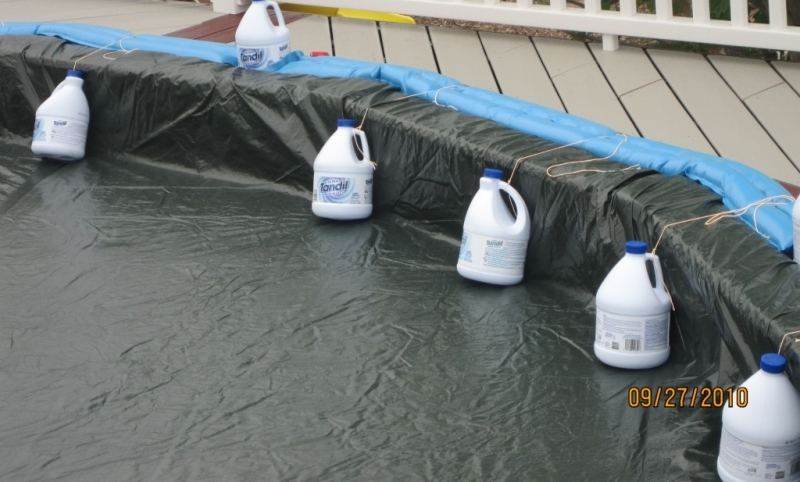 An above-ground pool secured for winter